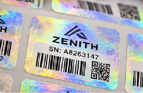Serialized hologram labels combine an optical security layer with unique printed data such as sequential numbers, alphanumeric codes, barcodes, or internal batch references.