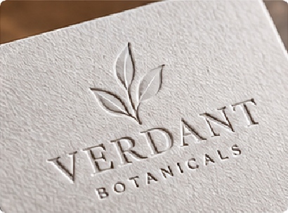 Embossing raises selected areas while debossing presses them inward, adding tactile structure to paper or compatible label materials.